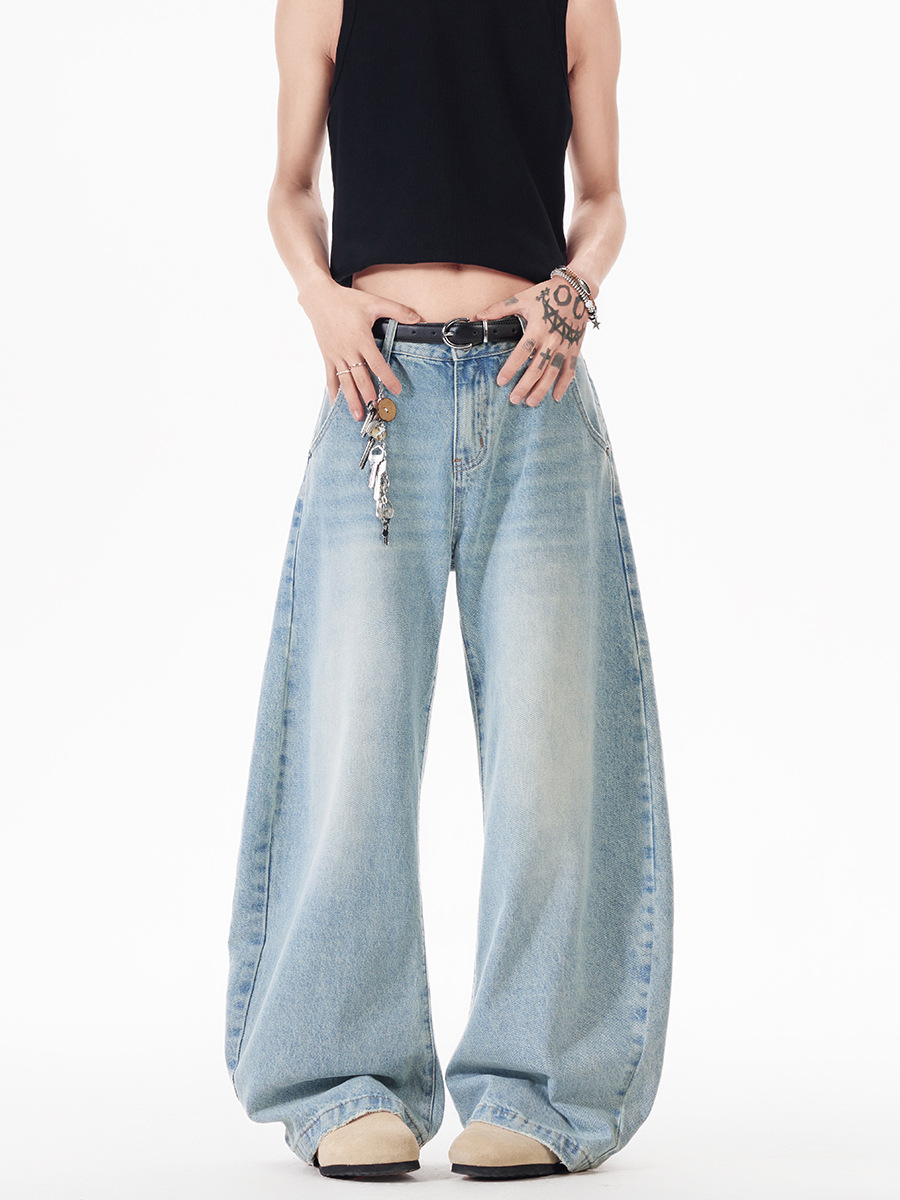 Light blue washed curved-leg wide-leg jeans
