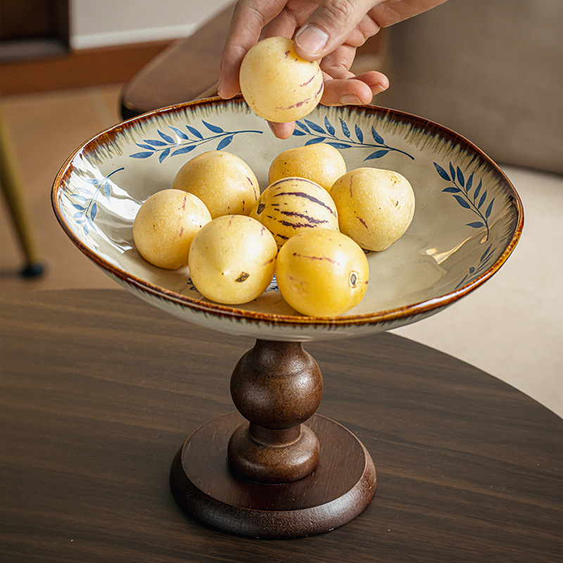 Wooden tall-footed fruit plate and snack plate
