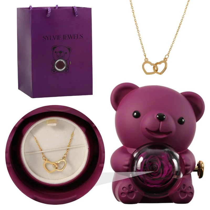 Eternal pink teddy bear with a necklace