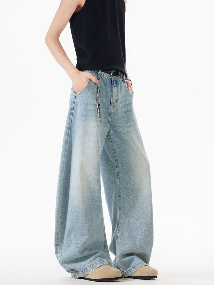 Light blue washed curved-leg wide-leg jeans