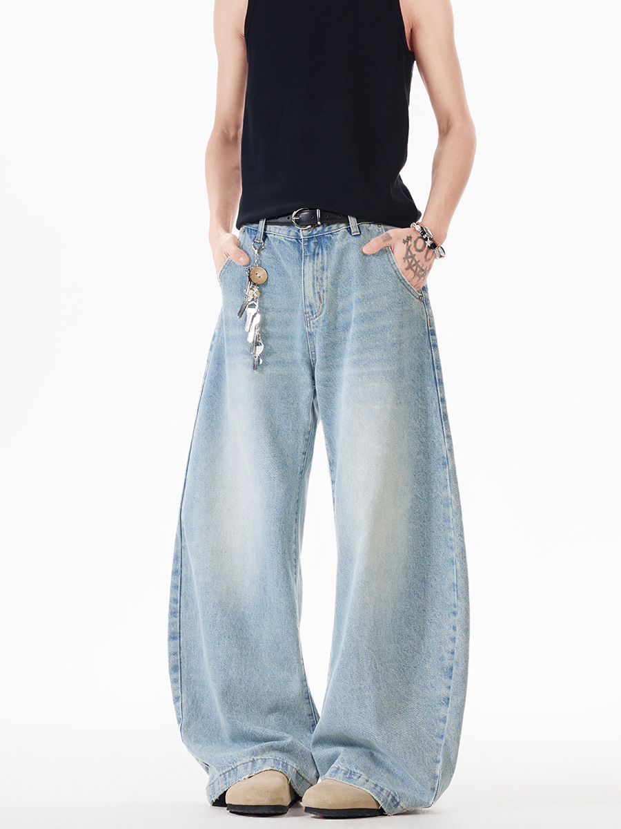 Light blue washed curved-leg wide-leg jeans