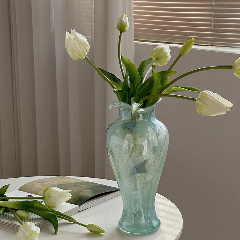 Transparent glass vase with blue patterns