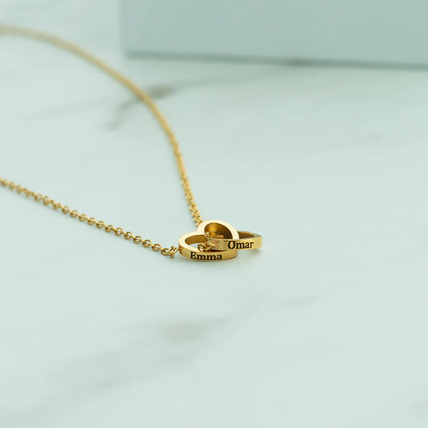 Eternal pink teddy bear with a necklace