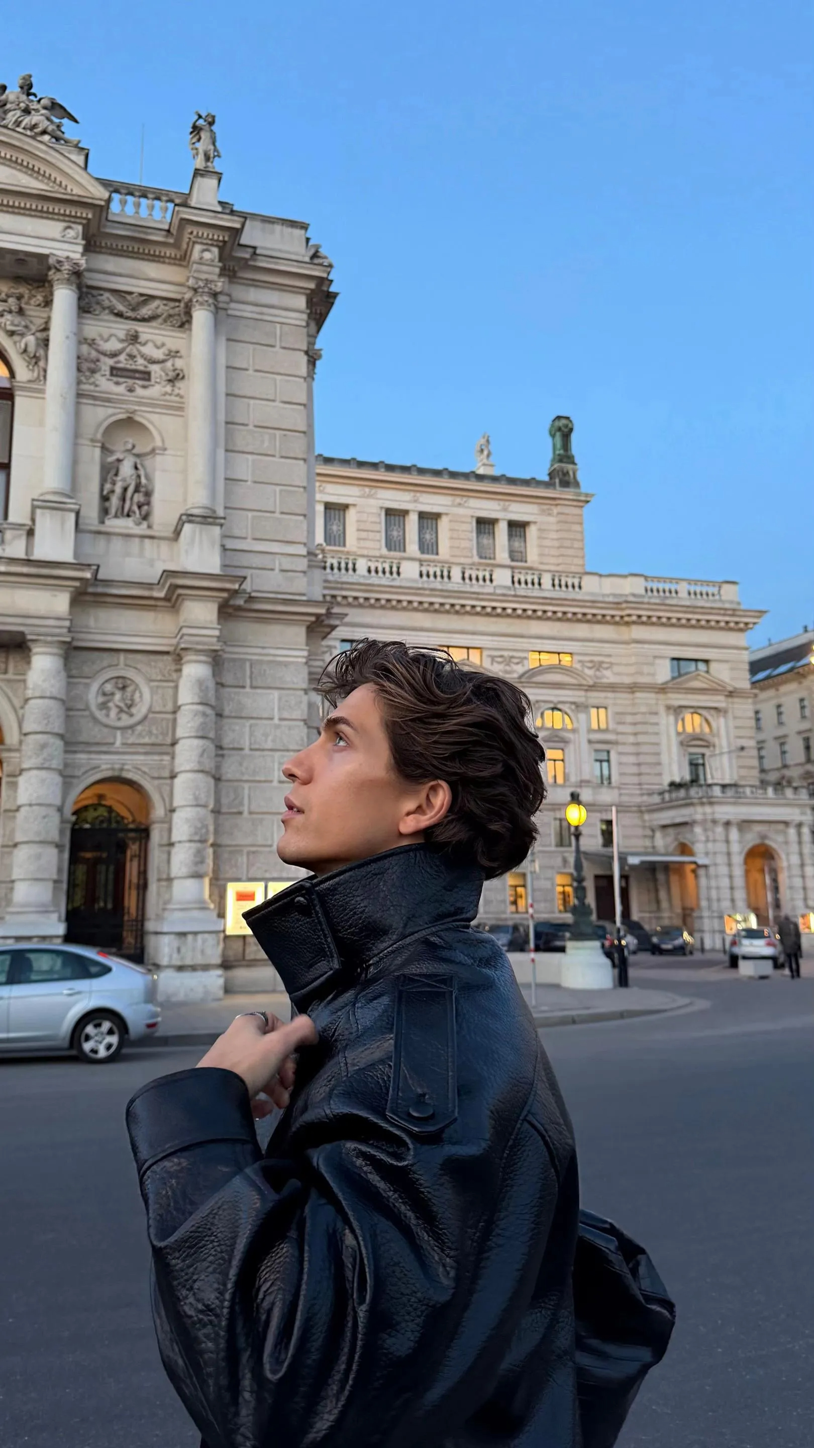 Vintage motorcycle-style leather jacket with a stand-up collar