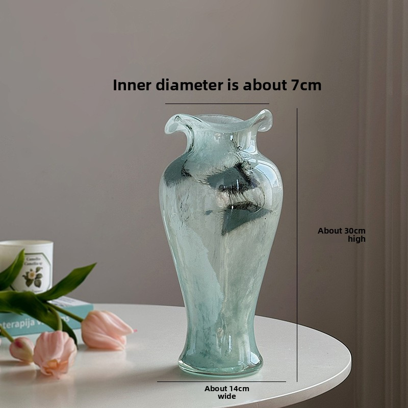 Transparent glass vase with blue patterns