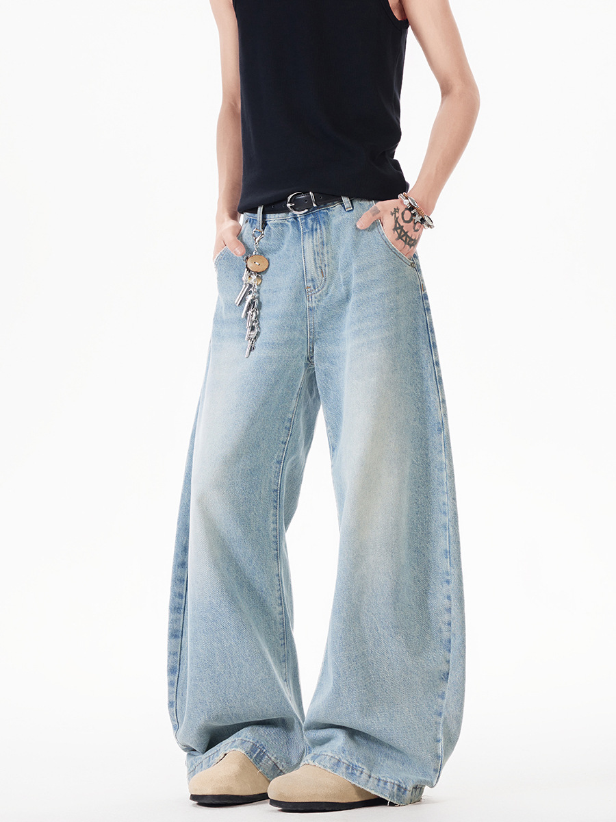 Light blue washed curved-leg wide-leg jeans