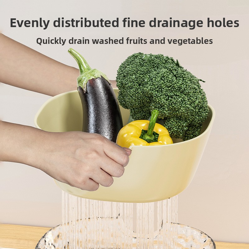 Double-layer draining basket for washing fruits and vegetables in the kitchen
