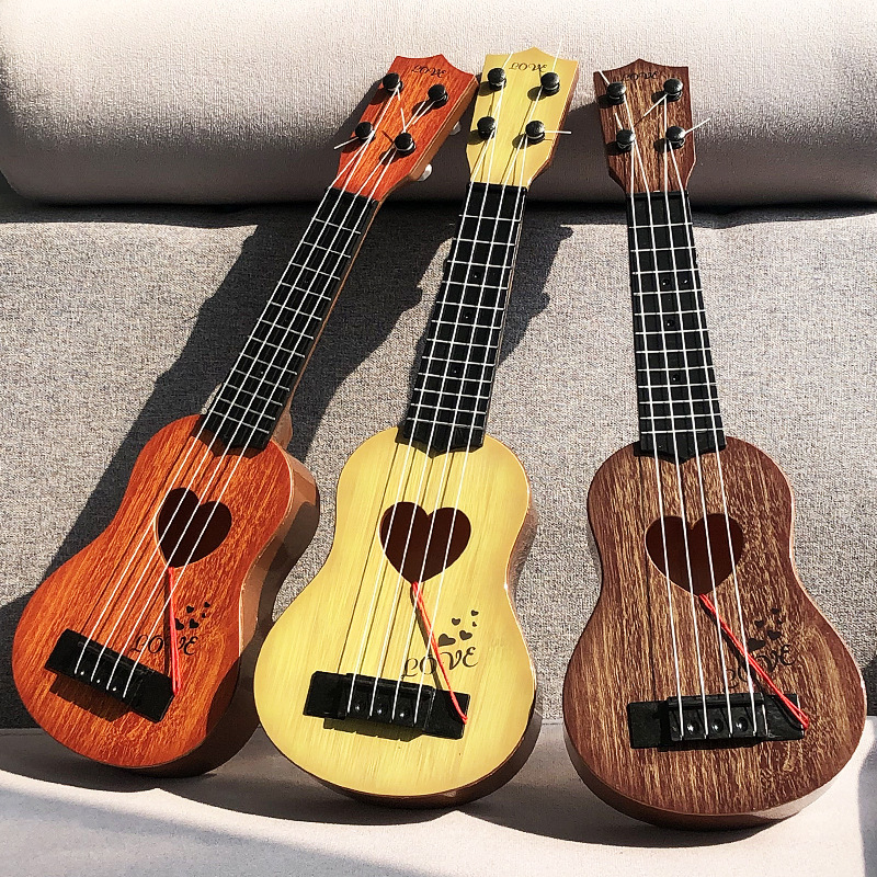 Small-sized mini children's musical instrument toy guitar, music simulation playable ukulele