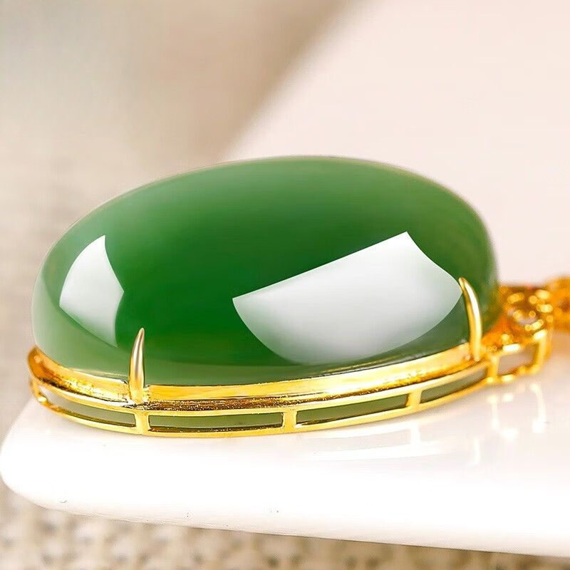 18k gold inlaid cabochon cat's eye jade pendant