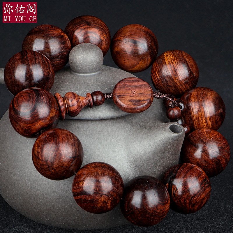 High-end Hainan Huanghuali bead bracelet, old material with ghost face and matching eyes, collectible item