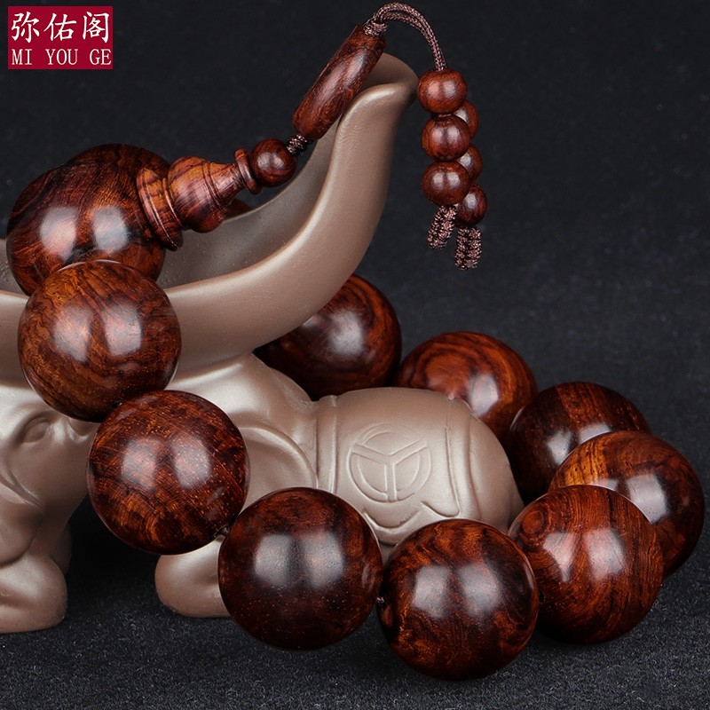 High-end Hainan Huanghuali bead bracelet, old material with ghost face and matching eyes, collectible item