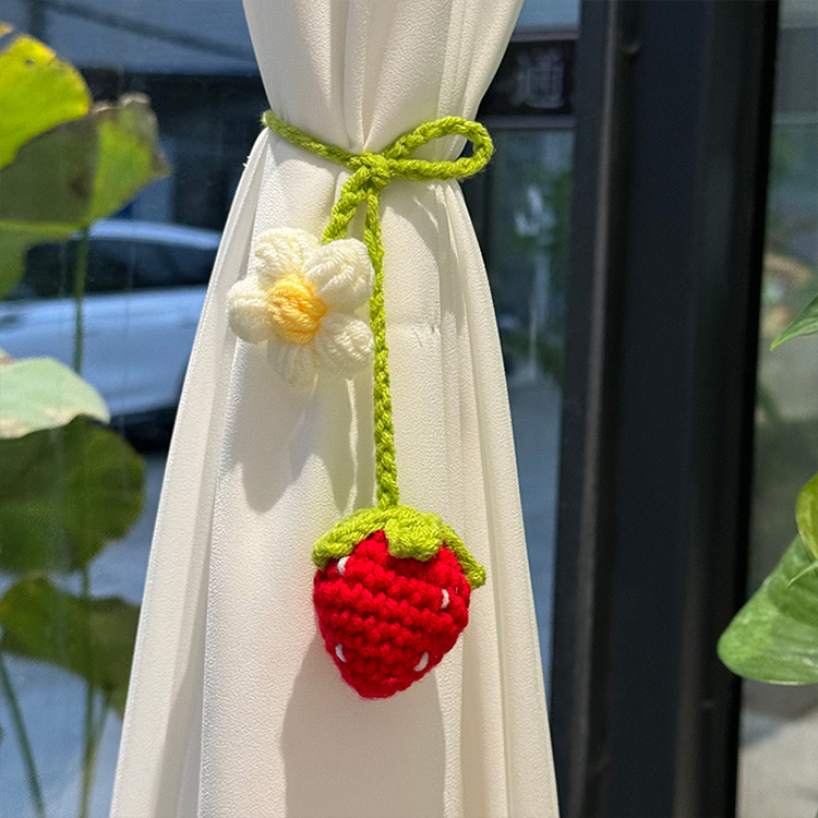 Hand-crocheted strawberry and sunflower pendant