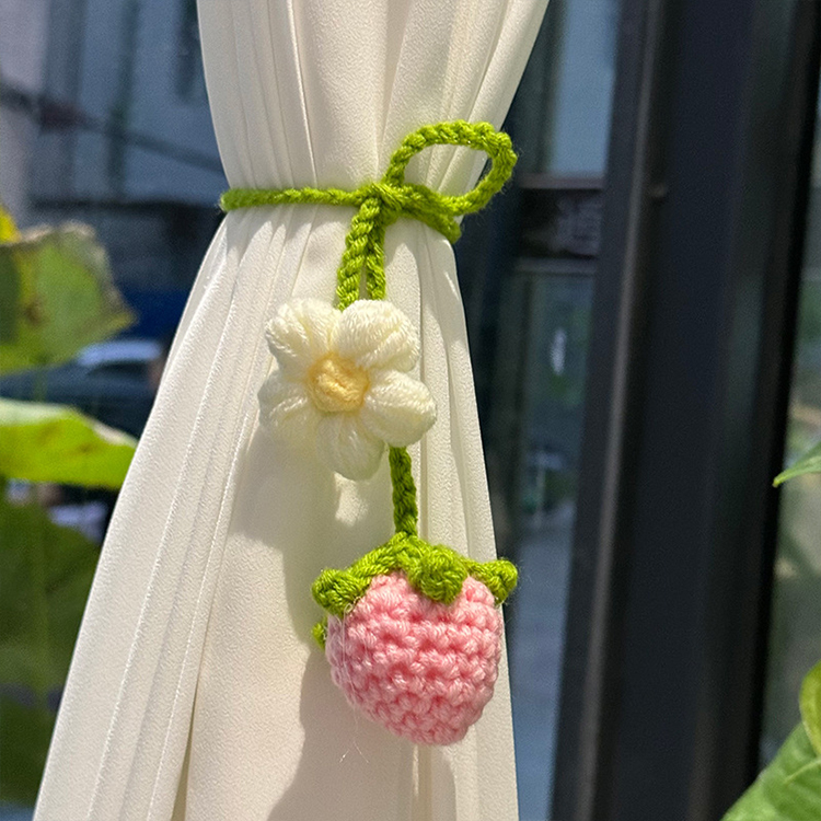 Hand-crocheted strawberry and sunflower pendant