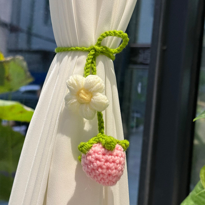 Hand-crocheted strawberry and sunflower pendant