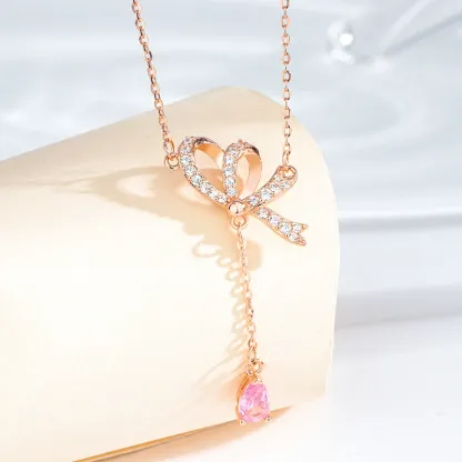INS3272-SWAROVSKI Volta Necklace, Earrings, and Bracelets Jewelry Collection, Bow-Inspired Pink and Clear Crystals with Rose-Gold Tone Finish