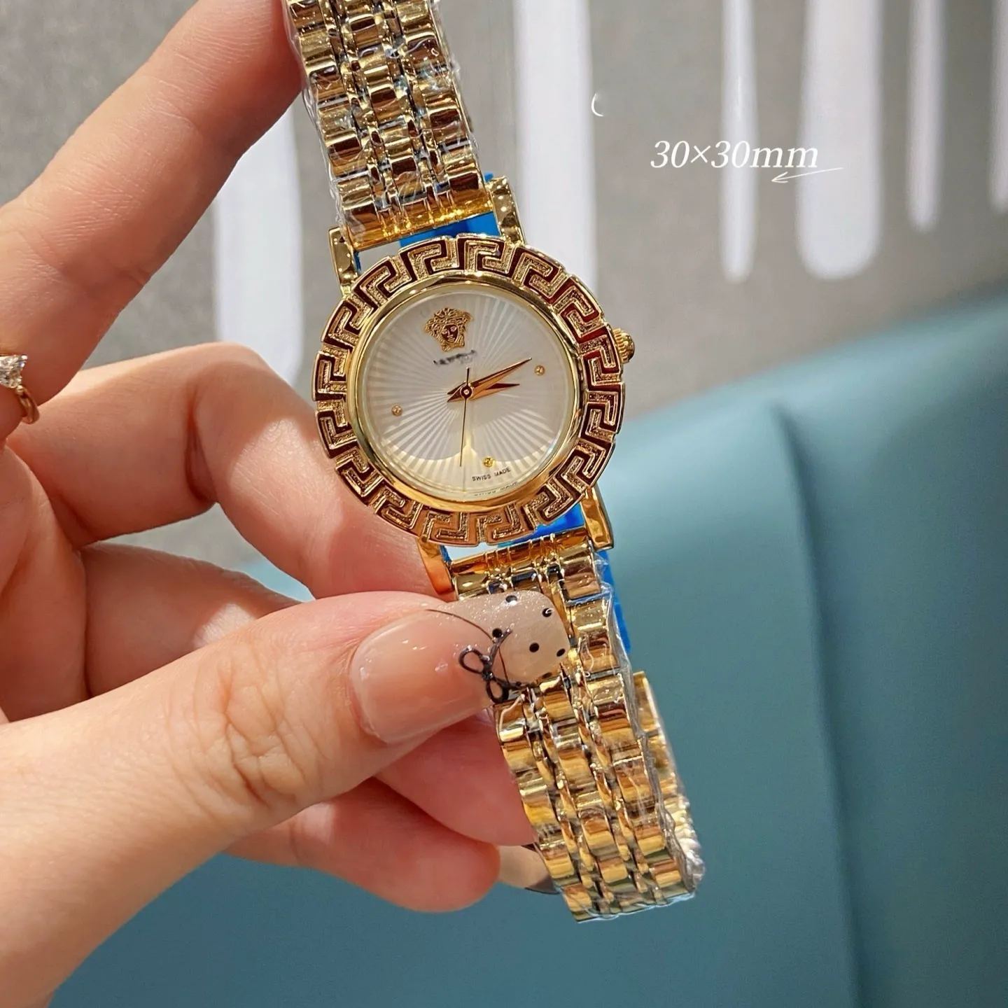 W-2041-Versace Versace Reve Collection Luxury Womens Watch Timepieces with a Gold Bracelet and Case featuring a Black Dial