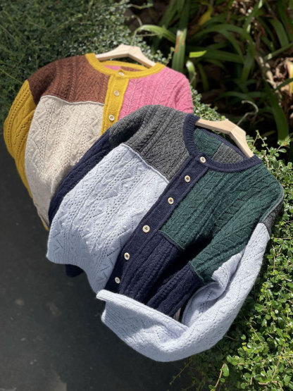 Irregularly pieced together crew neck wool knit cardigan