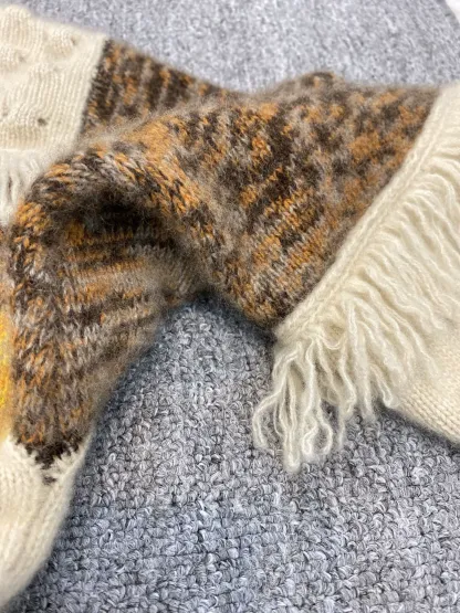 Women's Color Blocked Striped Thickened Sweater with Tassel Detail Round Neck Loose Knitted Pullover Sweater