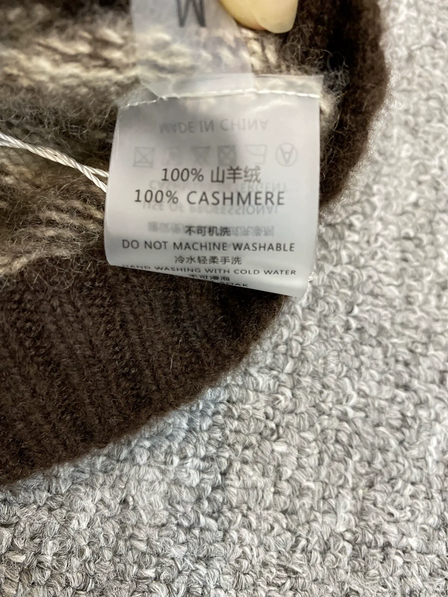 Women's Color Blocked Striped Thickened Sweater with Tassel Detail Round Neck Loose Knitted Pullover Sweater