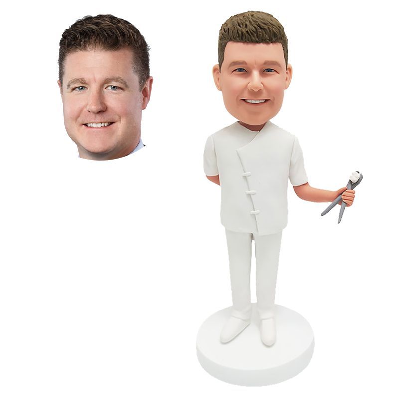 custom made bobblehead figure male dentis holding a dental forceps