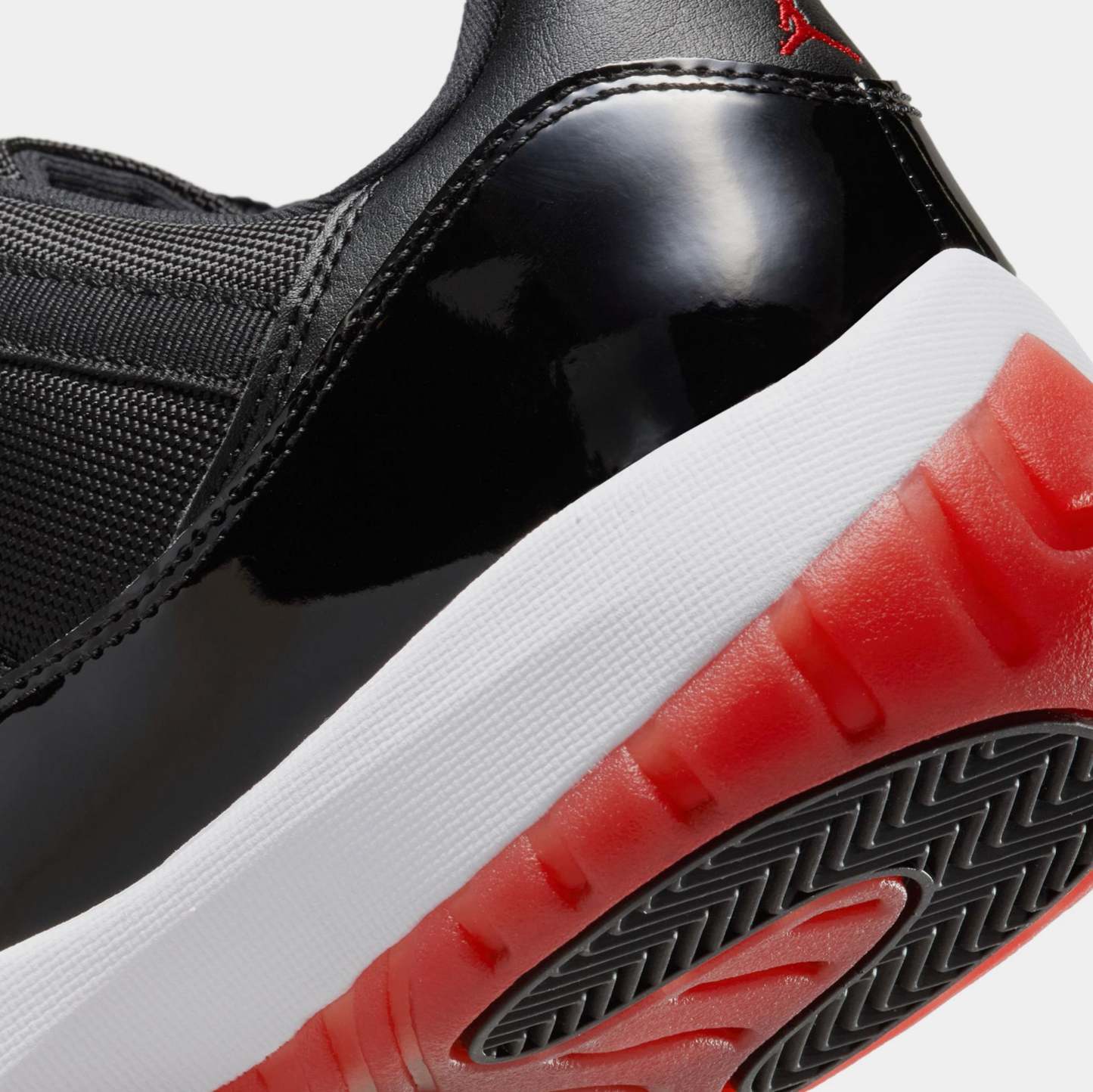 Air Jordan 11 Retro Low Bred Mens Lifestyle Shoes (Black/Varsity Red/White)