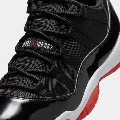 Air Jordan 11 Retro Low Bred Mens Lifestyle Shoes (Black/Varsity Red/White)