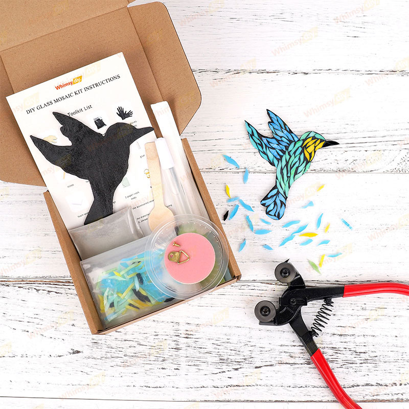 Everything you need to make a hummingbird glass mosaic. Wooden base, broken glass, grout, etc.