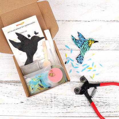 Everything you need to make a hummingbird glass mosaic. Wooden base, broken glass, grout, etc.