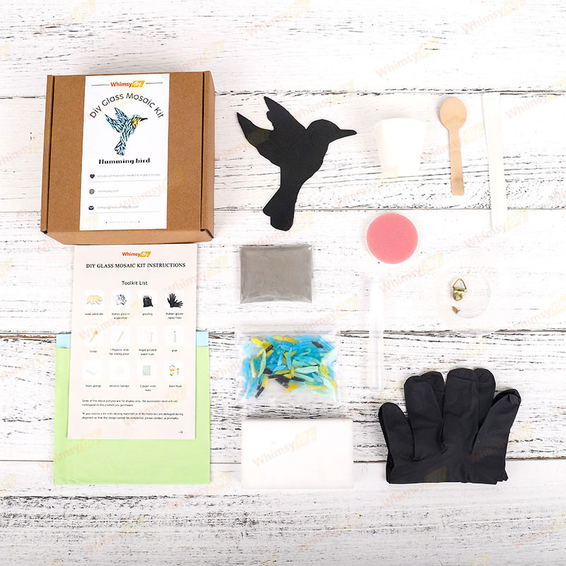 Everything you need to make a hummingbird glass mosaic. Wooden base, broken glass, grout, etc.