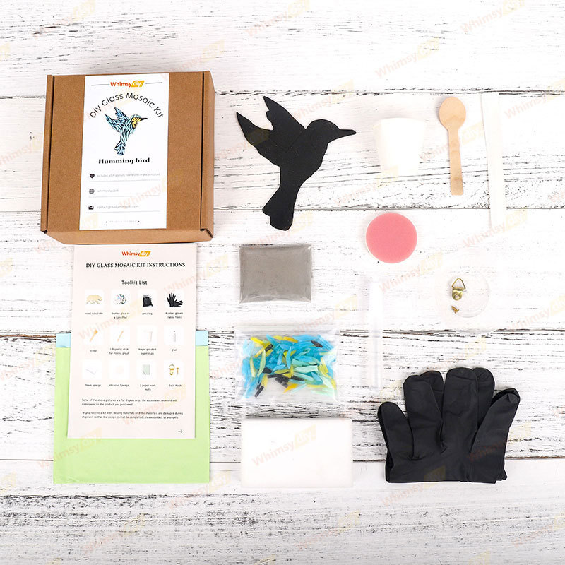 Everything you need to make a hummingbird glass mosaic. Wooden base, broken glass, grout, etc.