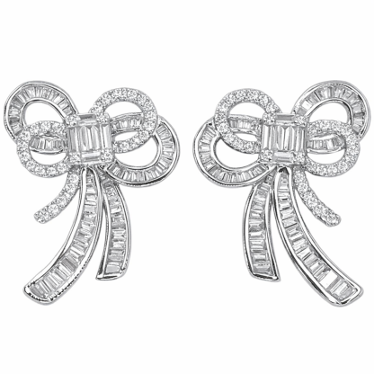 18-karat gold earrings in the shape of a butterfly, featuring a natural diamond of 1.40 carats set in a tapered baguette cut within a channel setting.