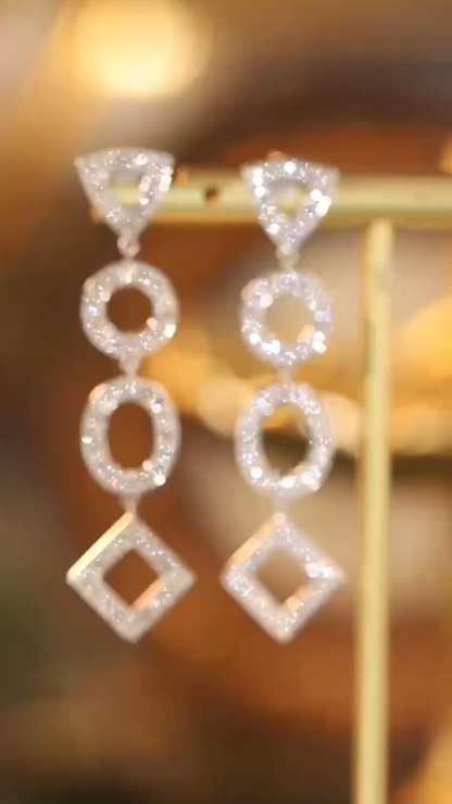 18k gold earrings set with a 2.00-carat natural diamond