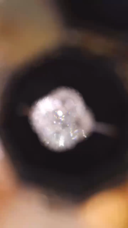 18k gold ring set with a natural diamond; the diamond features a Tapered Baguette cut and weighs 0.25carats.