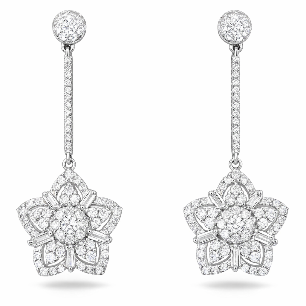 18k gold earrings in star shape, set with a natural diamond of 0.90 carats. Tapered Baguette Cut