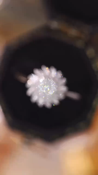 18k gold ring set with a natural diamond; the diamond features a Tapered Baguette cut and weighs 0.40 carats.