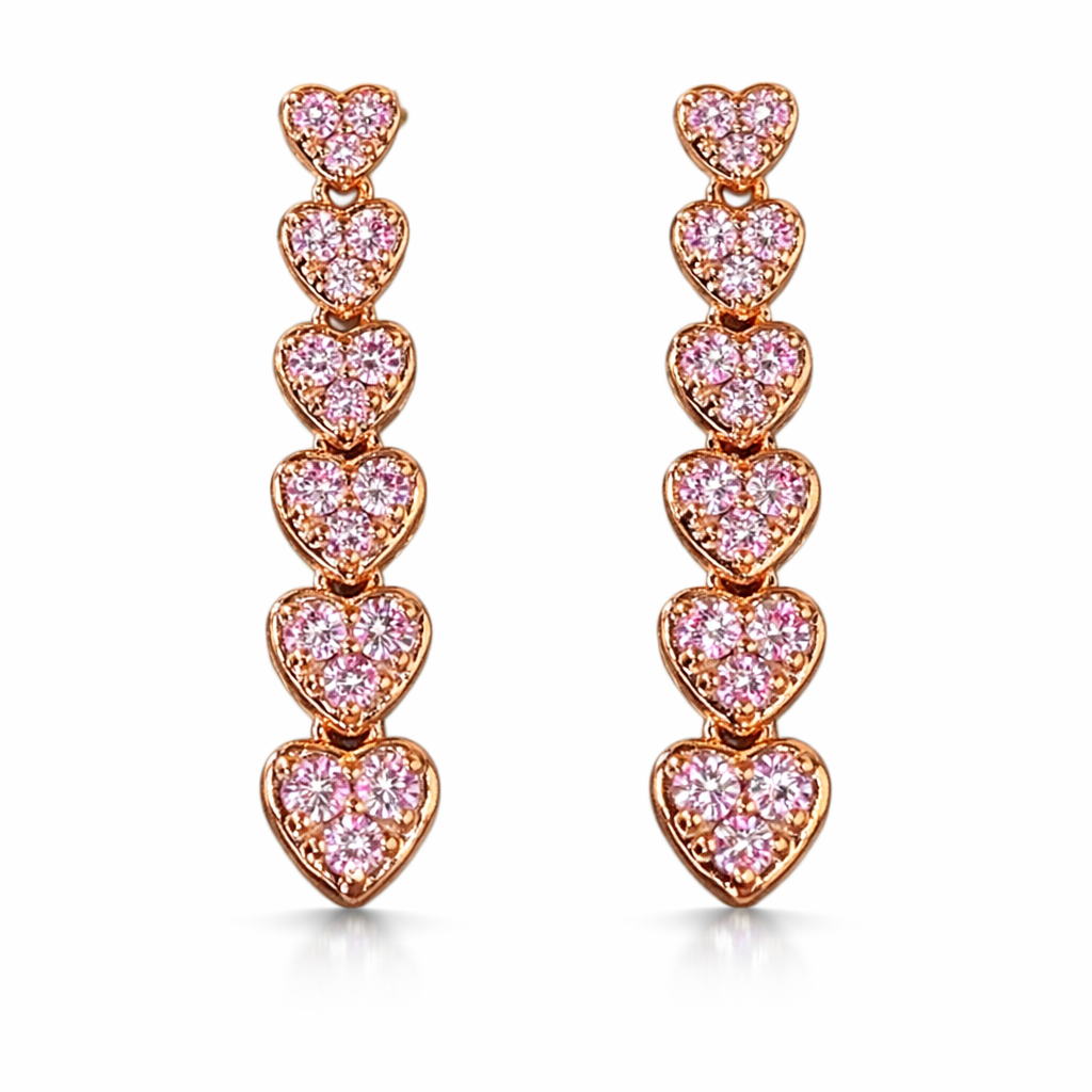 18k gold earrings set with a natural diamond of 0.50 carats, in the shape of a heart.