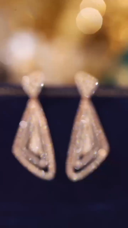 18k gold earrings with 0.50ct natural diamond
