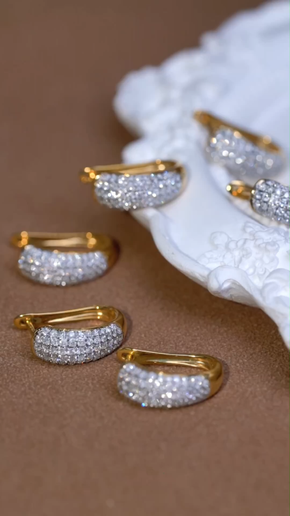 18k gold earrings set with 0.70ct natural diamond
