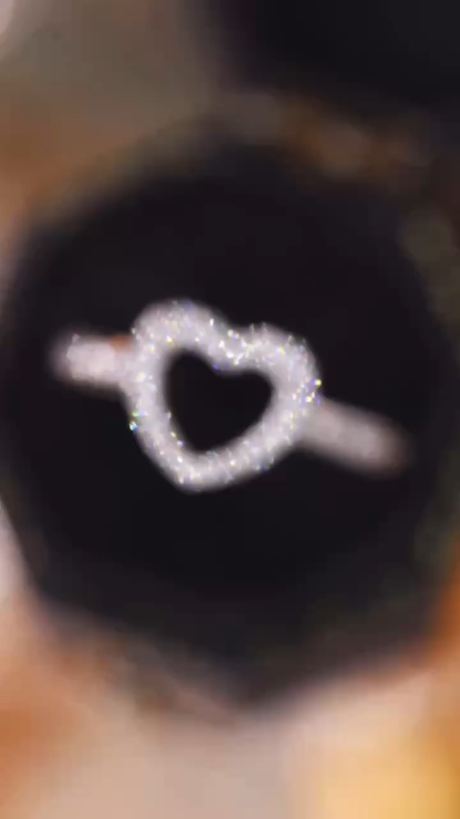 18k gold ring set with a natural diamond; the diamond features a Tapered Baguette cut and weighs 0.30 carats.