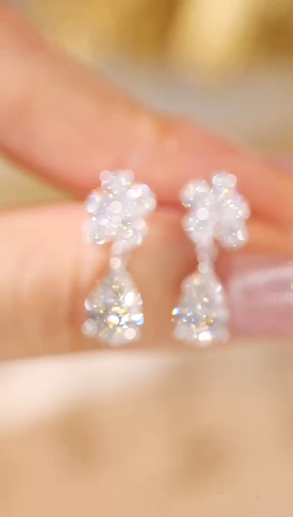 10k Gold Diamond Earrings: Droplet-cut 3.10ct Cultured Diamond, set in a three-prong design for an elegant look
