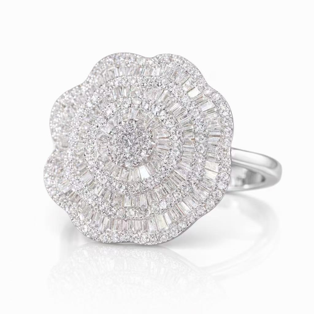 18k gold ring set with a natural diamond; the diamond features a Tapered Baguette cut and weighs 1.50carats.