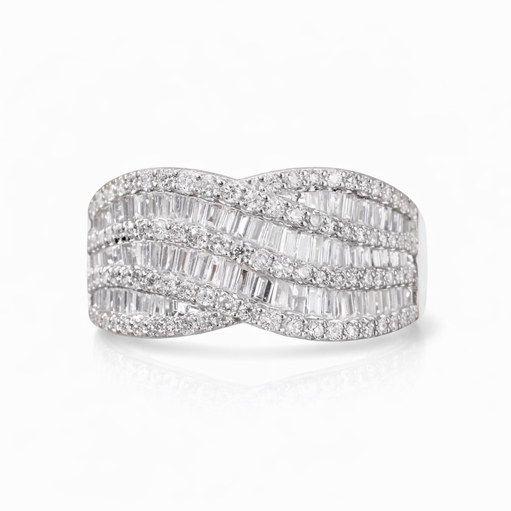 18k gold ring set with a natural diamond; the diamond features a Tapered Baguette cut and weighs 1.10carats.
