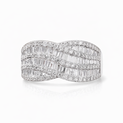 18k gold ring set with a natural diamond; the diamond features a Tapered Baguette cut and weighs 1.10carats.
