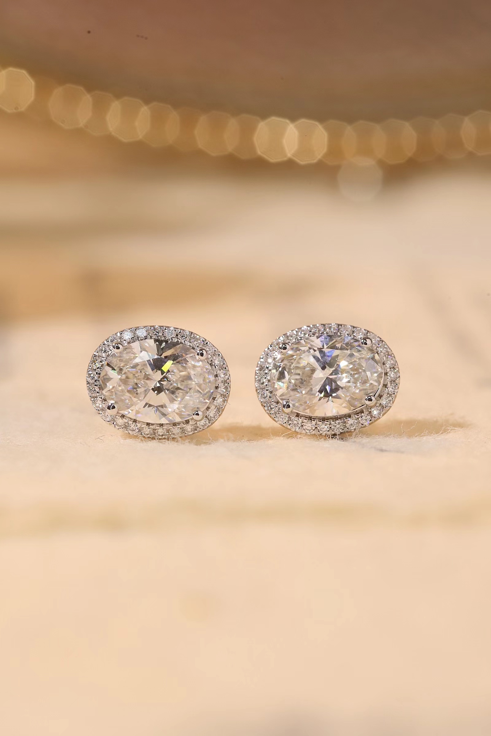 10K gold carat oval diamond earrings with four-prong setting