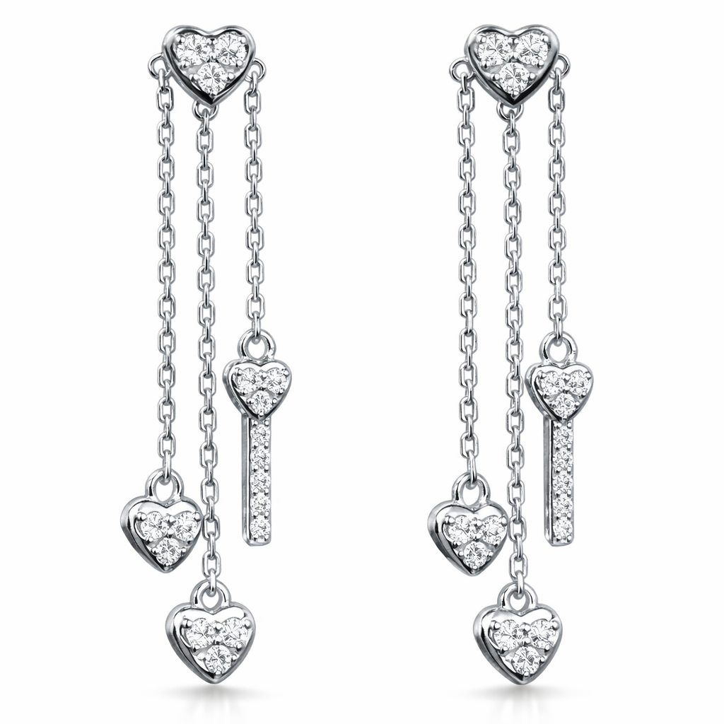 18k gold earrings set with a natural diamond of 0.46 carats, in the shape of a heart.