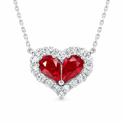 Heart-shaped 18k gold necklace set with a 0.92-carat ruby and a 0.45-carat diamond.