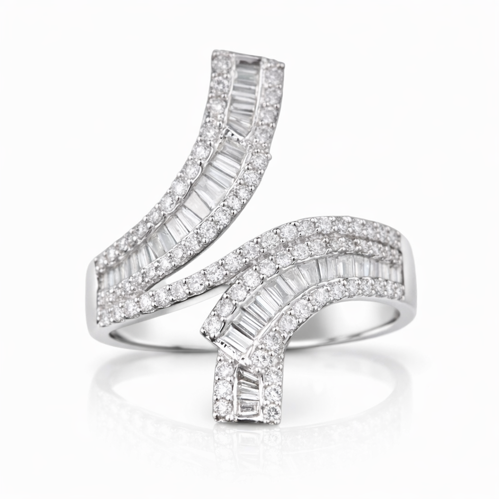 18k gold ring set with a natural diamond; the diamond features a Tapered Baguette cut and weighs 0.72carats.