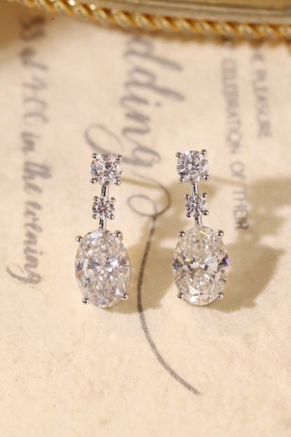 10K gold carat oval diamond earrings with four-prong setting