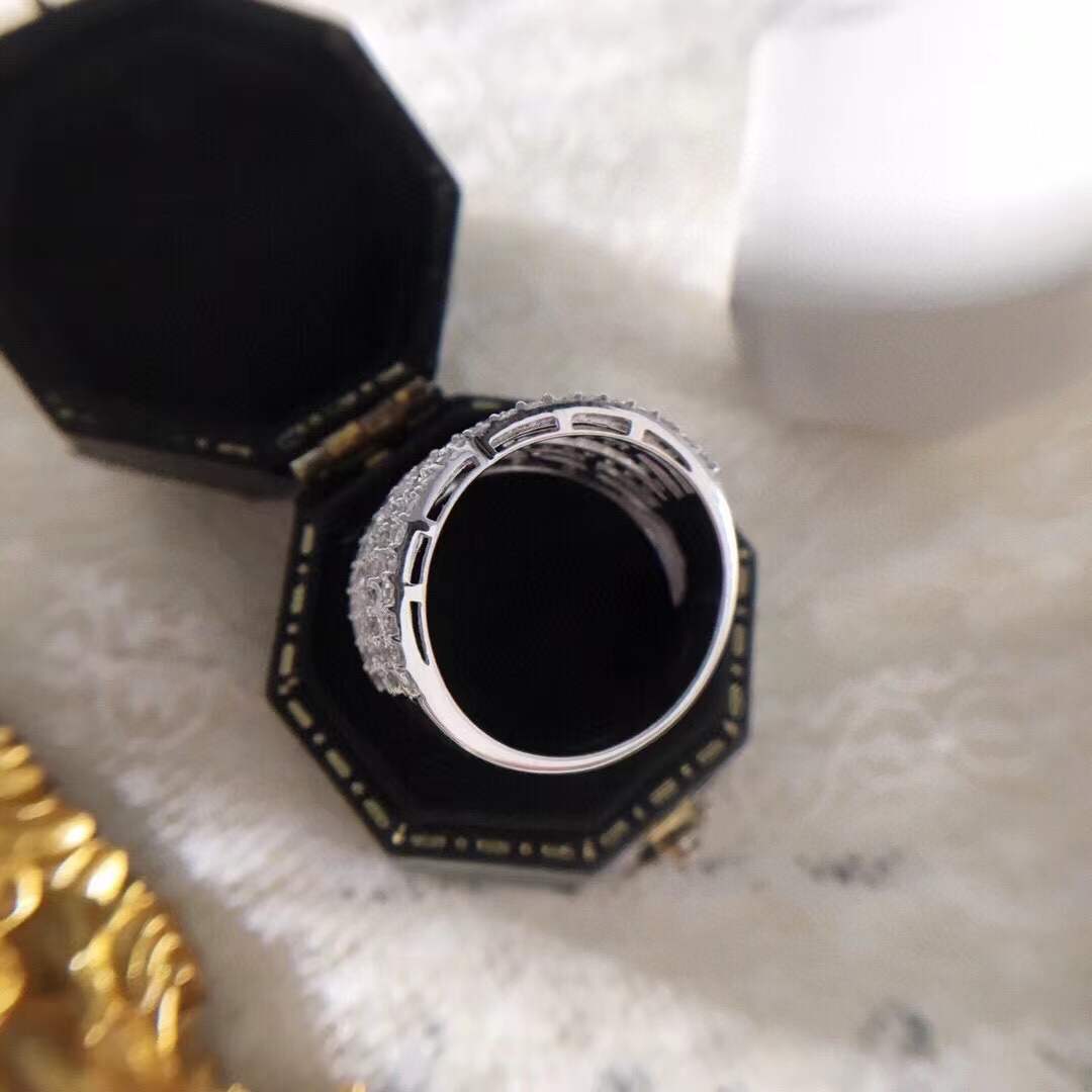 18k gold ring set with a natural diamond; the diamond features a Tapered Baguette cut and weighs 1.45carats.