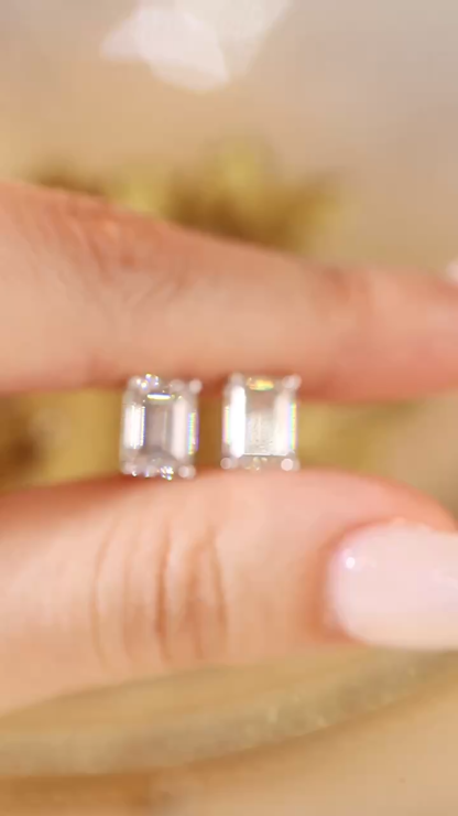 10K gold emerald cut four-prong earrings